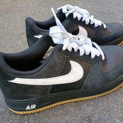 Nike Air Force 1 '07 LV8 in the "Black/White-Gum Light Brown" colorway (Style Code: IB6388-001).