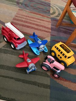 5 Green toy trucks