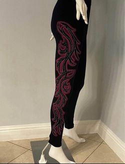 New Women’s leggings size one size New with tags Stretchy  design on sides Rhinestones on the sides
