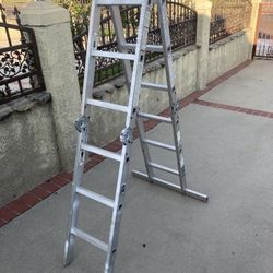 Krause MultiMatic Model 121482 12 ft Aluminum Multi-Position Articulating Ladder - Type 1A Industrial Extra Heavy Duty, 300 lb Capacity Discover this 