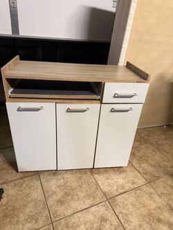 Kitchen Island Cabinet w/ Pull-Out Tray & Drawers. its in really good condition and shape
