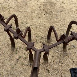 Antique tractor plow
