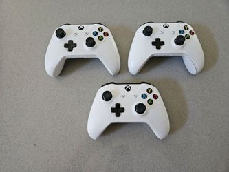 Three White Xbox One Wireless Controllers Model 1708