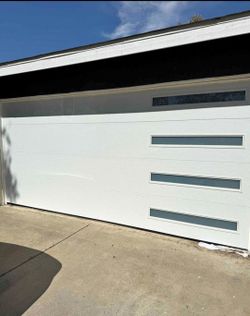 Modern White Garage Door with Glass Panels