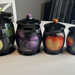 Beautiful Black Ceramic  Canister Set Featuring a Vi