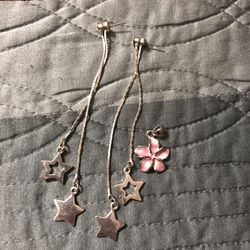 Earrings and charm