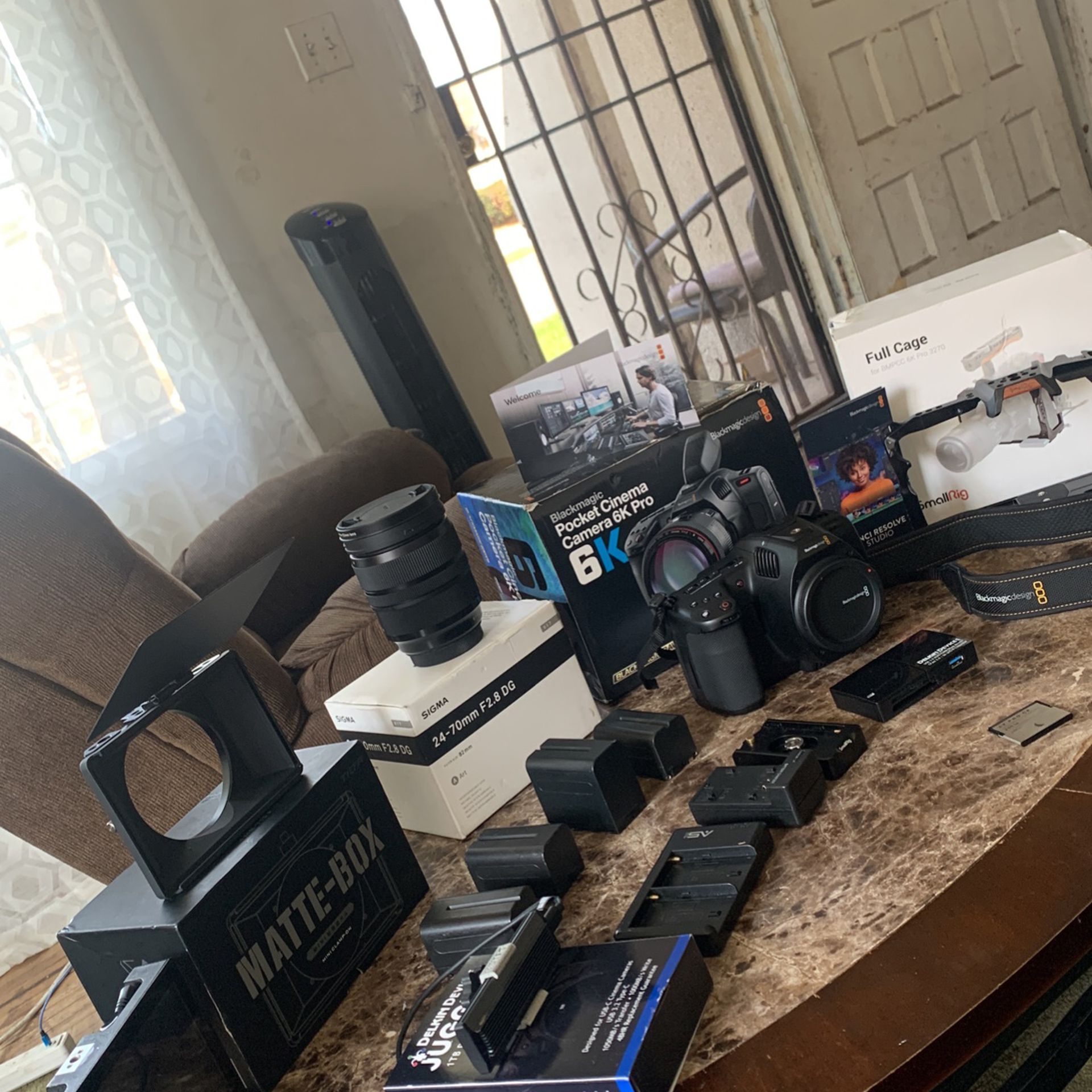 black magic 6K Pro with the 4k Monitor cage sigma 24-70 mm Lens With a fast card And a couple other accessories like batteries And MATTBOX