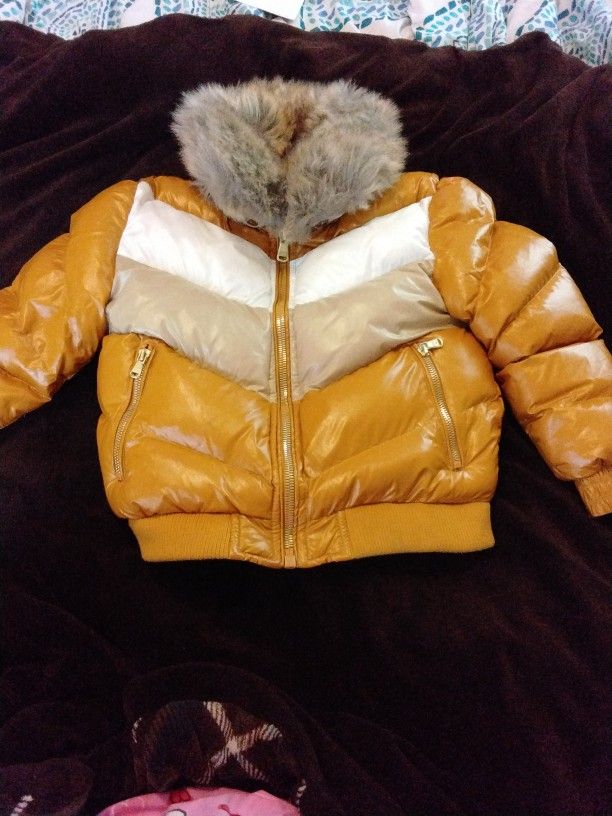 Golden Tan & White Boys Puffer Jacket with gold detailing & fur collar.Size Boys 8 & Golden Color Boys Nke Boots size 1youth