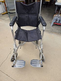 Manual transport wheelchair - foldable