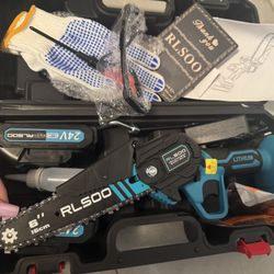 Mini Cordless Electric Chainsaw Brand New In Box + 2 Batteries, Carrying Case, Everything Needec