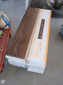 Floridatile Cherry wood 8"X36" tile model # CHDE966018X36