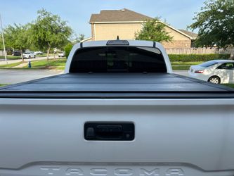 Rough Country Tri fold  flip up bed cover for 2106-2023 Toyota Tacoma