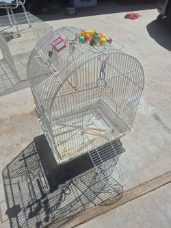 white coated-metal rounded-top bird cage