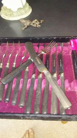 Antique forks & knife set. Ebony handles stainless and silver. German made. Presented in a beautiful box