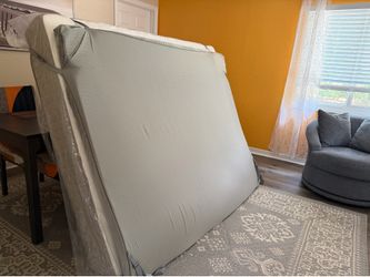 Queen size mattress with a topper