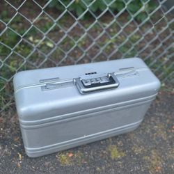 LOW PRICE MOVING- $900 RETAIL METAL SUITCASE 