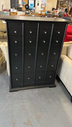 (In store) Tall black dresser