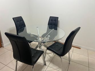 Glass top round dining table w 4 black chairs / mesa de comedor redonda de vidrio con 4 sillas negra