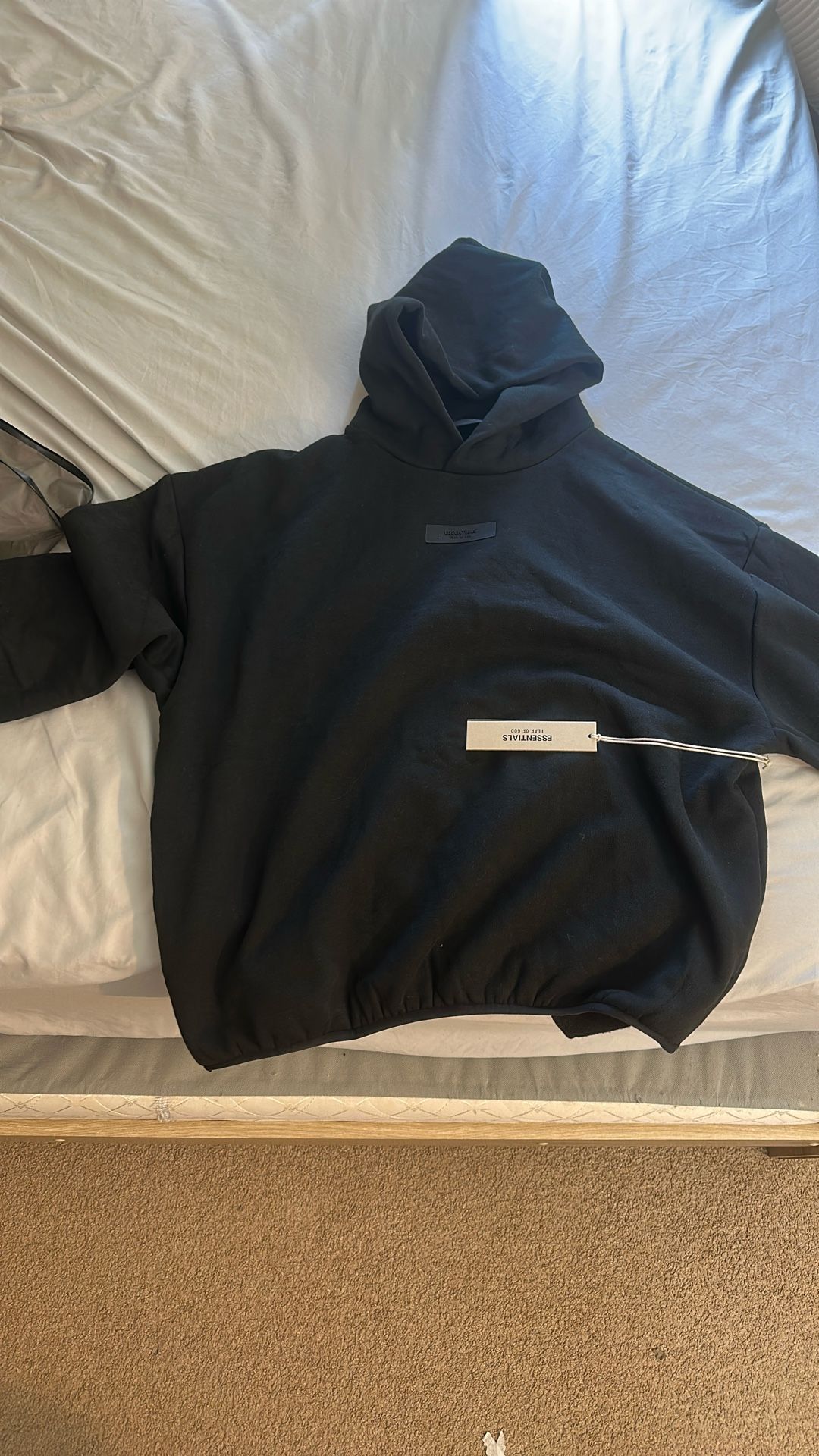 ESSENTIALS FEAR OF GOD HOODIE SMALL BLACK COLOR. BRAND NEW WITH TAGS.