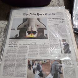 space shuttle Atlantis final launch newspaper