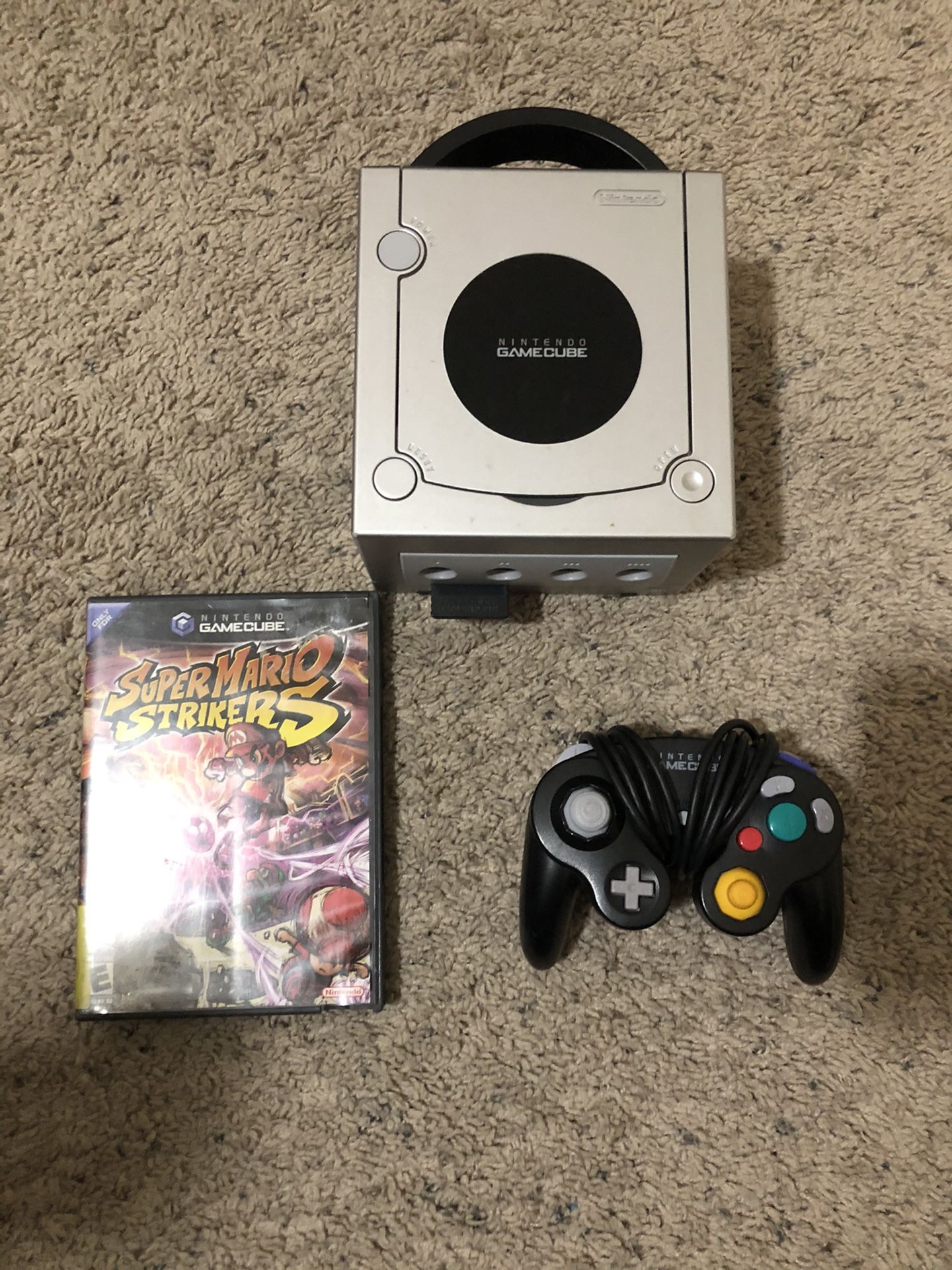 Used Silver Nintendo Gamecube + OEM Controller, Memory card, & Super Mario Strikers