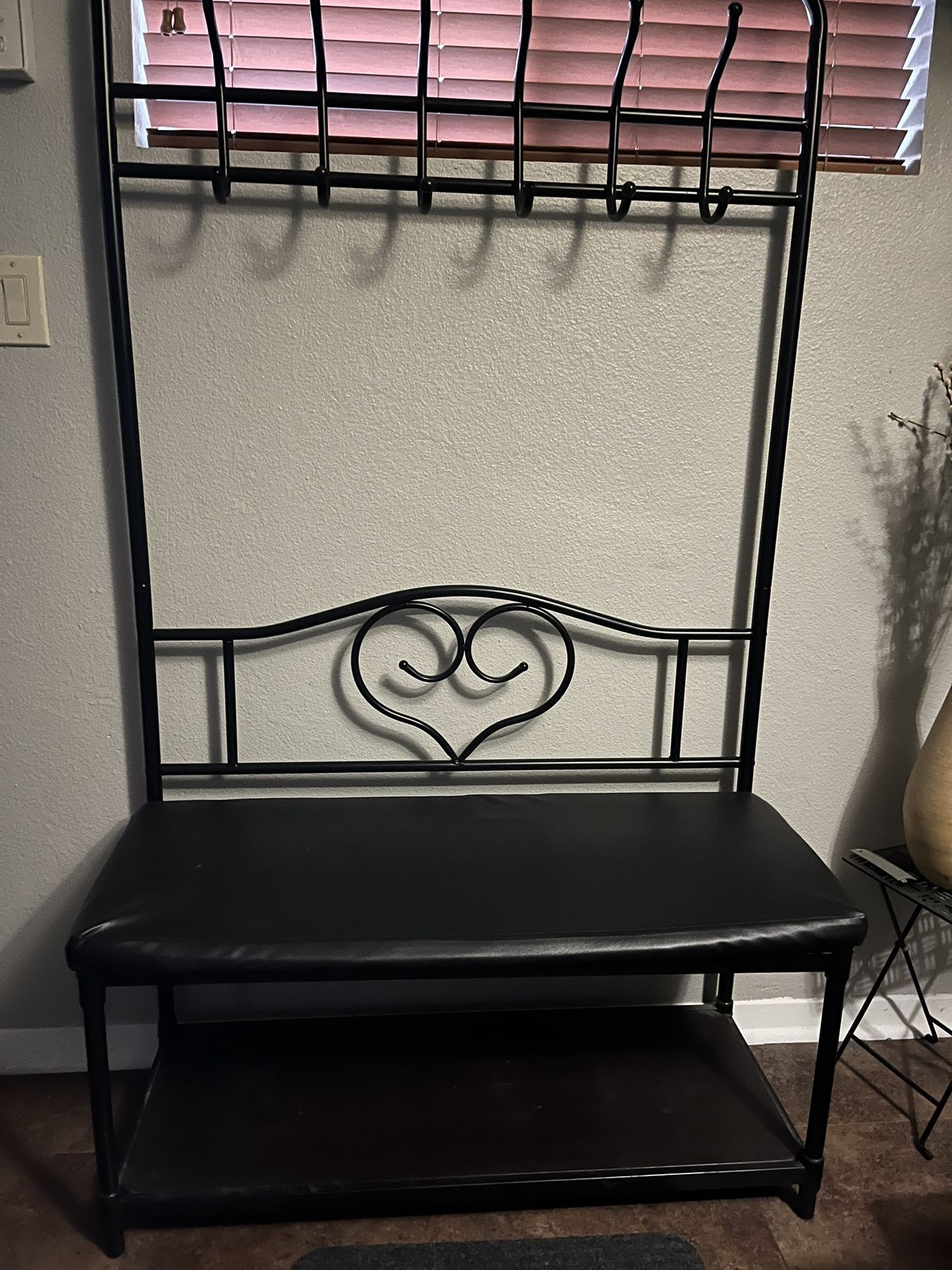 Entrance bench with coat rack and shoe storage