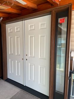 New double doors fiberglass with 2 slides size w101 h81.3/4  right hand open first Inswing $1950 jam is 6.1/2 Compasite frame molding to