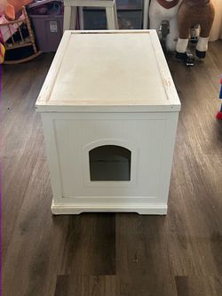 White wooden cat litter box enclosure