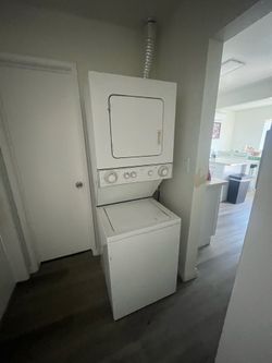 FREE BROKEN STACKED WASHER AND DRYER