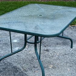 large heavy metal patio table. BRING MUSCLE 