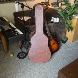 Beat up Alvarez guitar case