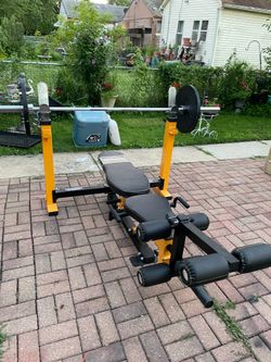 300lbs weight plates + bench/squat rack and barbell NEW