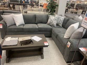 Grey L-shaped sectional couch