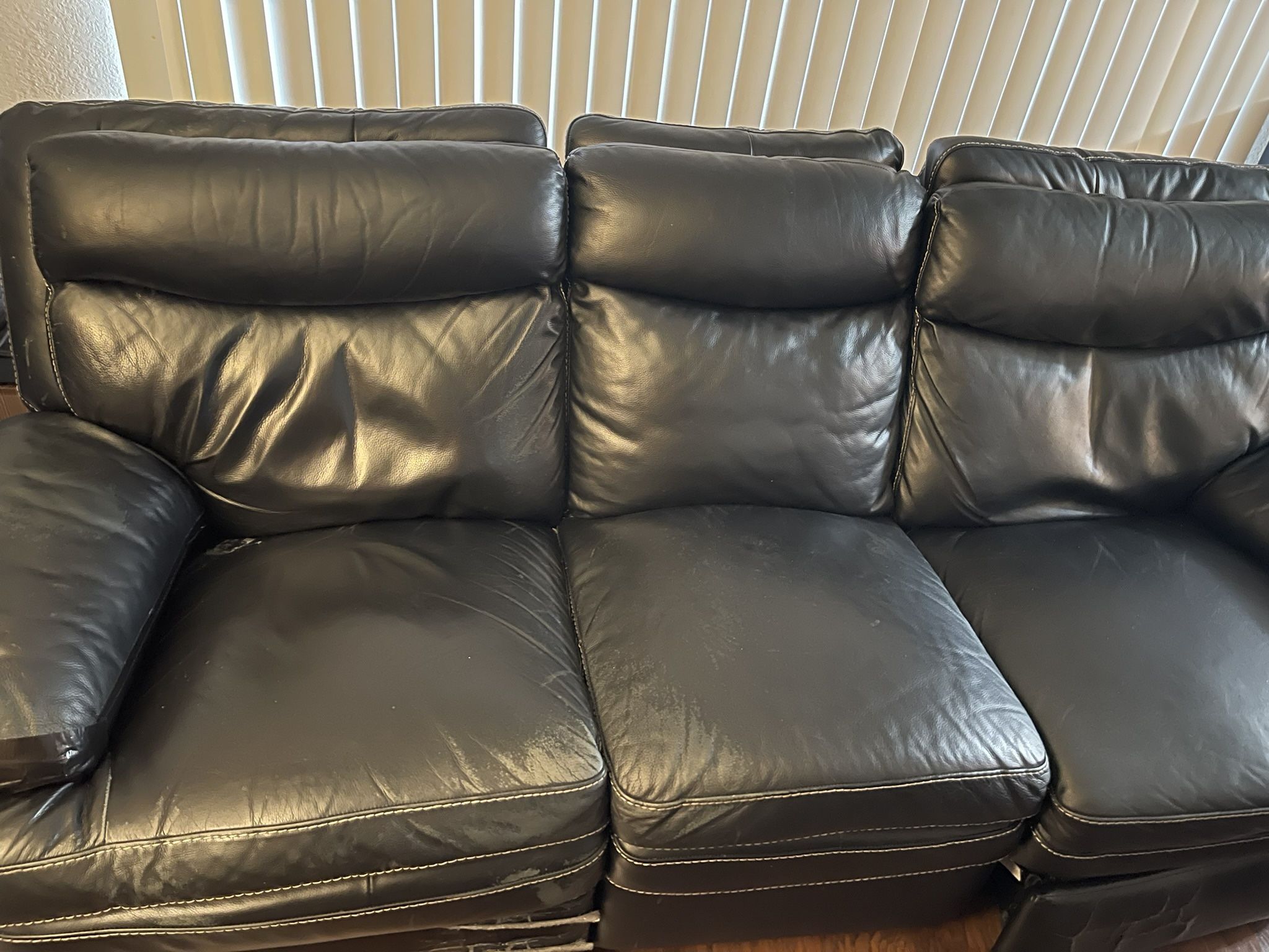 Leather Reclining Sofa