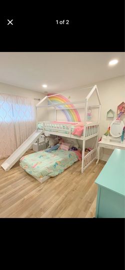 Modern bunk bed with stairs, slide, and ladder