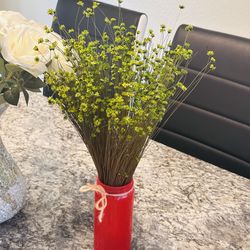 Nature dried flowers with red vase