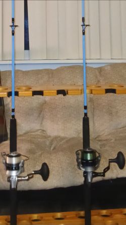 2New Strong Salt water reeks 1)Tsunami BARRIER ll 6000 1)new OZARK TRAIL 5000 both on 2 New Penn Wrath 2 piece 7'0 rods