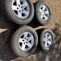 Jeep Wrangler TJ wheels 265 70 16 tires 5x114.3 bolt pattern