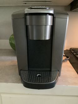 LIKE. EW KUERIG SINGLE CUP COFFEE MAKER