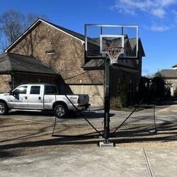 Goaliath 54 inch in ground basketball hoop, adjustable basketball court 