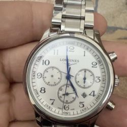 A broken mechanical watch that doesn't keep time. I'll take it away for a look.