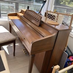 Upright Piano And Bench