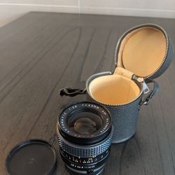 Minolta Miida F2.8, 35mm prime wide angle lens with leather exterior, soft fabric interior lined hard case