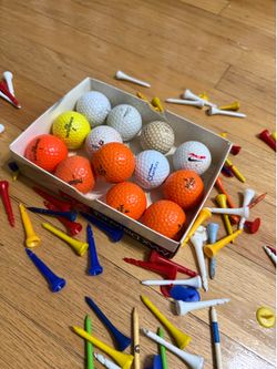 13 Golf Balls and Tees USED
