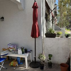 B 9ft Umbrella With Stand. 2025.   Excellent Condition!