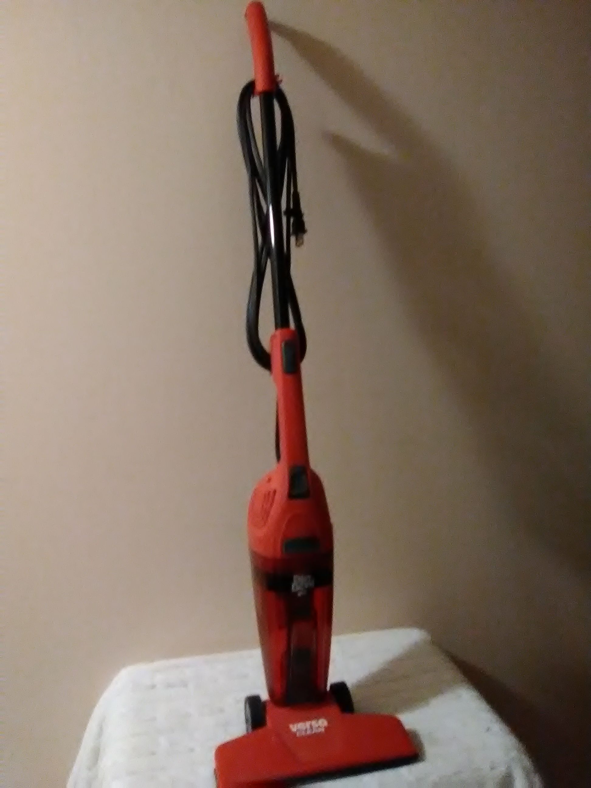 Dirt Devil small stand-up vacuum cleaner. Model is Versa Clean, with easy clean filter. Is lightweight, and 120 volts.