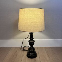 26” Tall Distressed Black Spindle Table Lamp With Beige Linen Lamp Shade