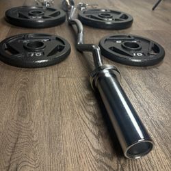 Beautiful BRAND NEW Curl Bar With Pair Of 25s And 10s   All BRAND NEW in cardboard tube/box.  Need Better Price$$$  I recommend that you look for used