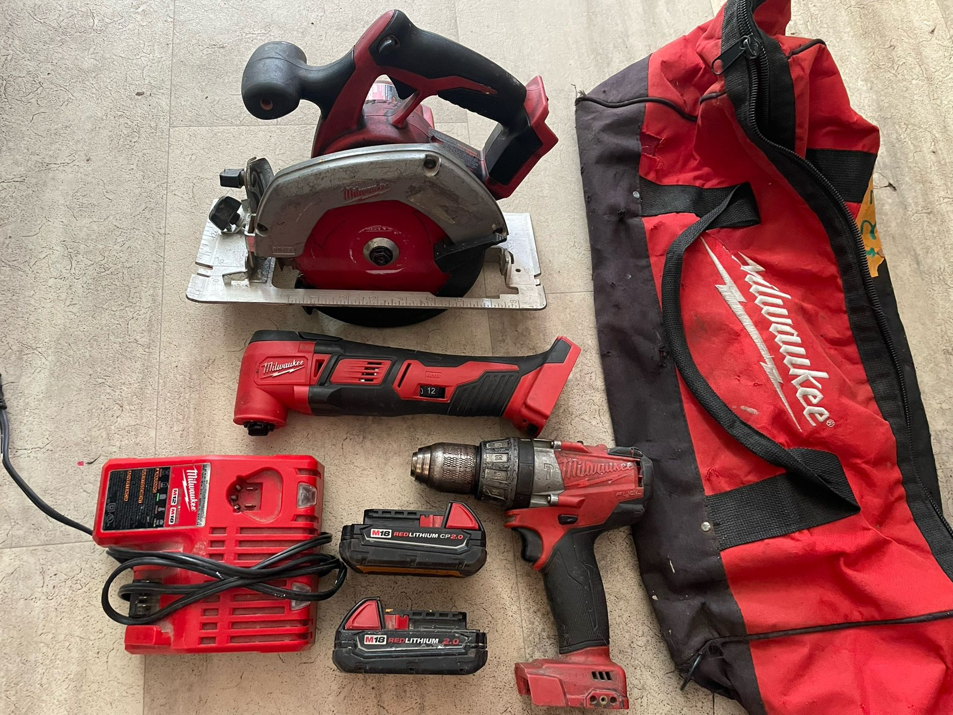 Milwaukee M18 Hammer Drill, Multi Tool, Skillsaw Combo