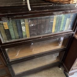 Antique 100 Year Old Barrister cabinet Lawyer Bookcase  Not sure exact measurements but it’s very standard size   Probably about 36in across 14in deep